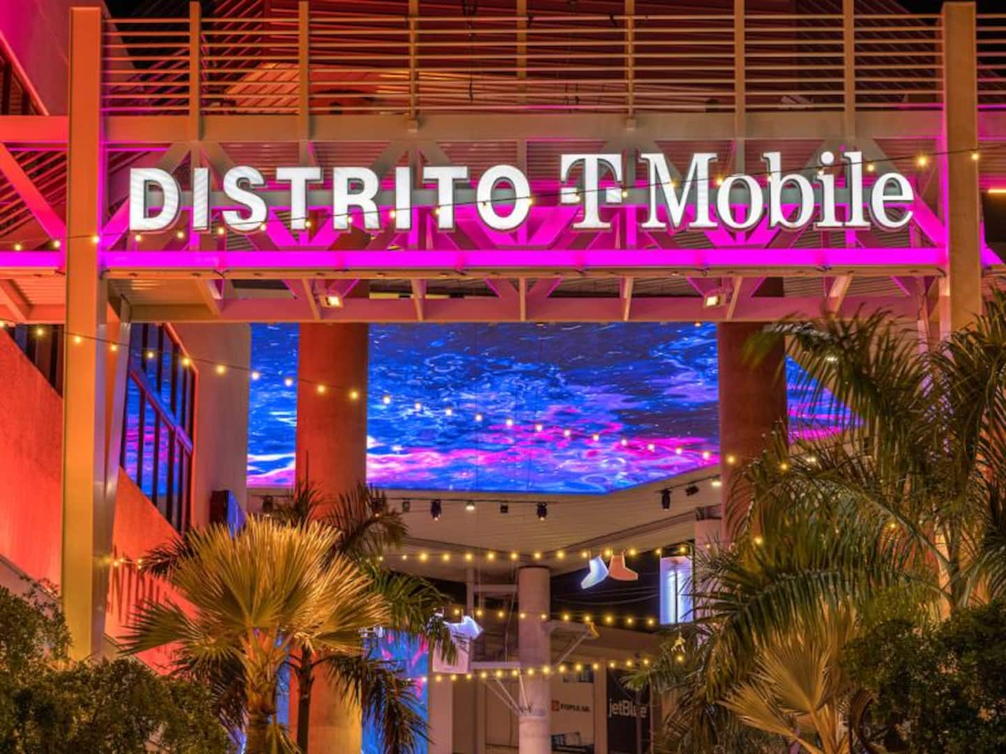 Distrito T Mobile entertainment district at night